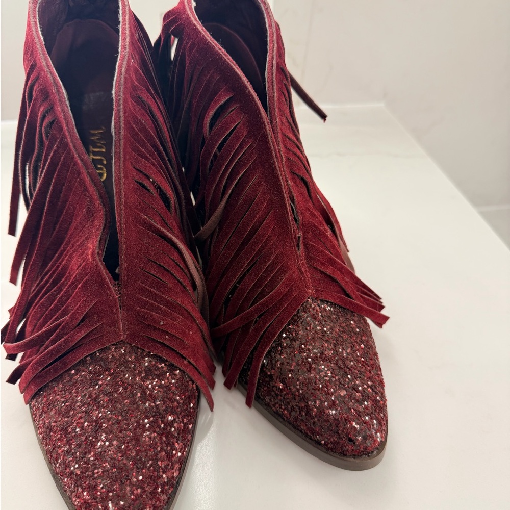 Look here .  Elegant Red Fringe Women's Shoes